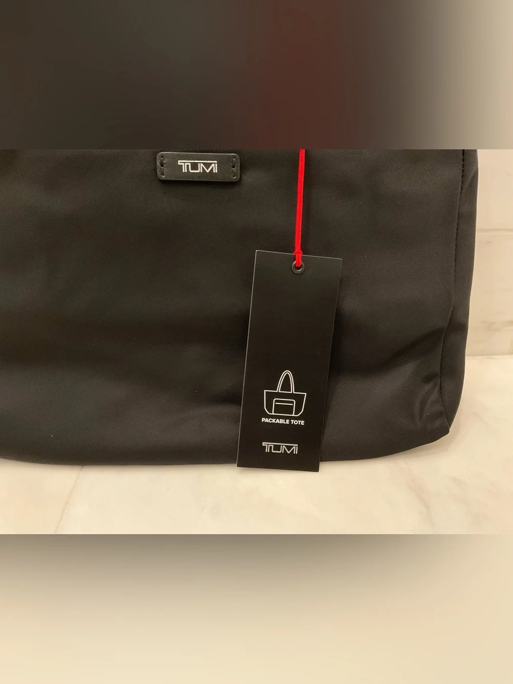 Tumi up sale
